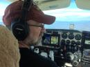 Dave Bridgham, N1AHF, at the controls of his private aircraft.